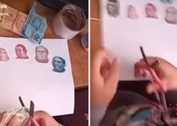 Video de niña que recorta billetes para hacer tarea