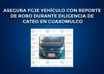 Asegura FGJE vehículo con reporte de robo durante diligencia de cateo en Cuaxomulco